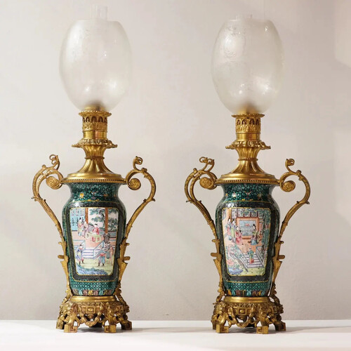 A pair of 19th C. Chinese enamelled Canton vases mounted as oil lamps with a gilt bronze mount