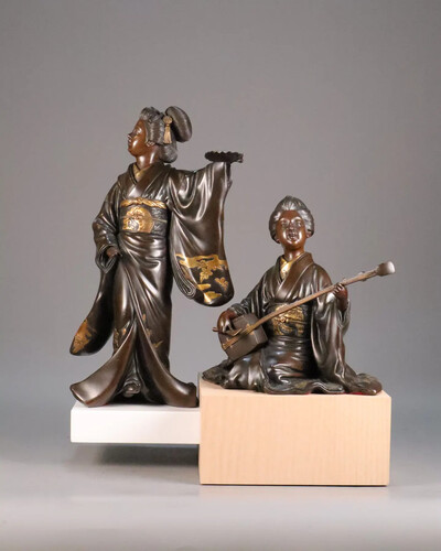 A pair of 19th century Japanese bronze sculptures
