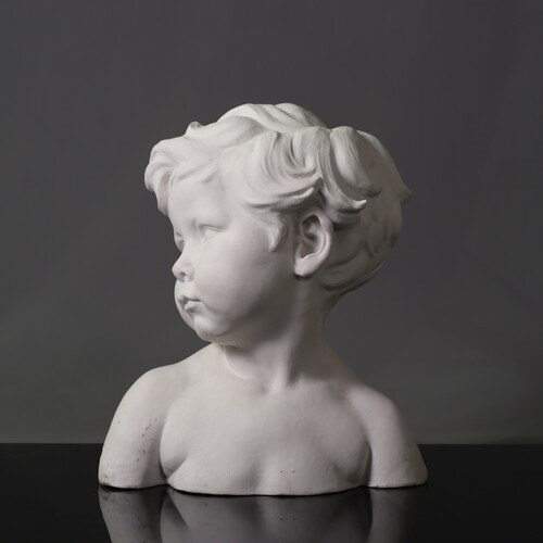 Biscuit porcelain bust of a young boy signed dalou