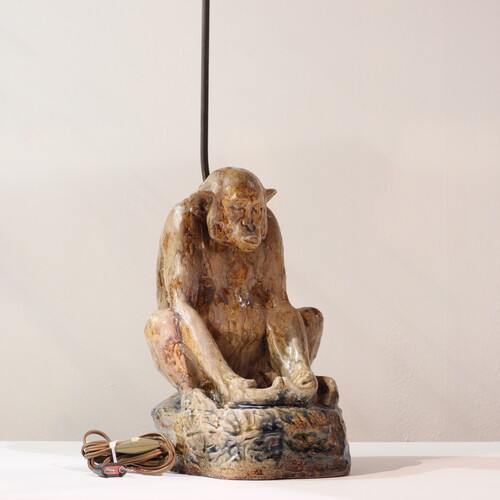 Ceramic monkey around 1900 mounted as a lamp