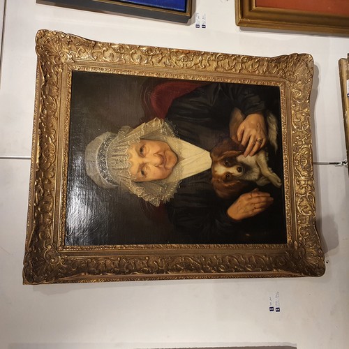 Large oil on canvas portrait of an old woman with his dog. 19th C