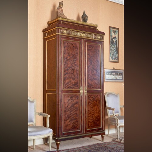 AN ORMOLU-MOUTED MAHOGANY CABINET